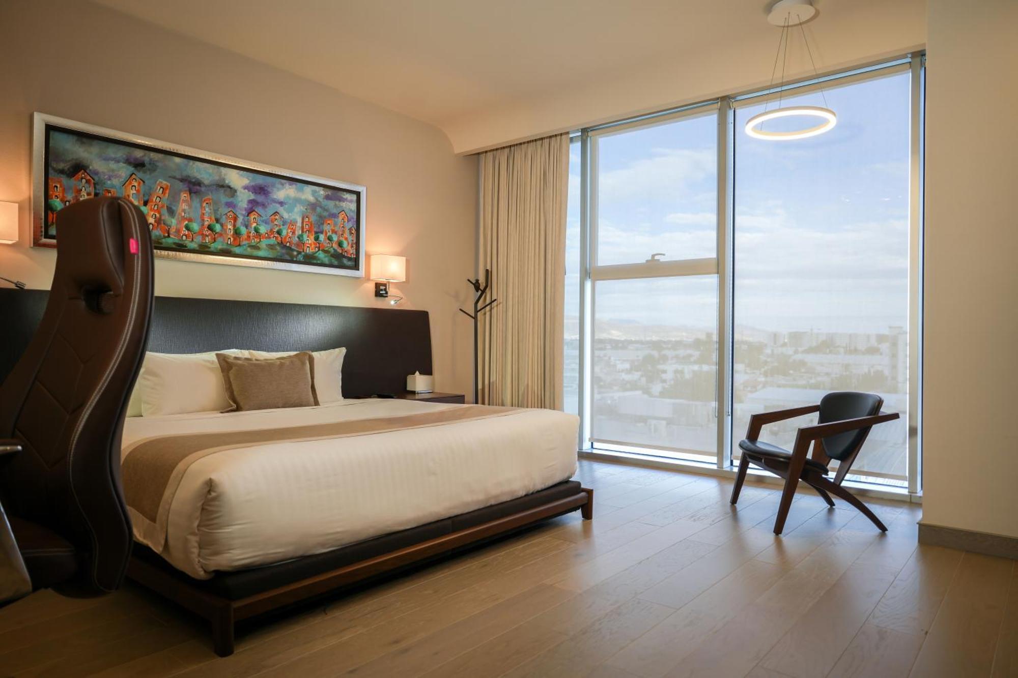 Metria Hotel เลออน ภายนอก รูปภาพ A bedroom at the hotel